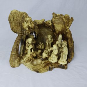 Grotto with tree with sheep on the top